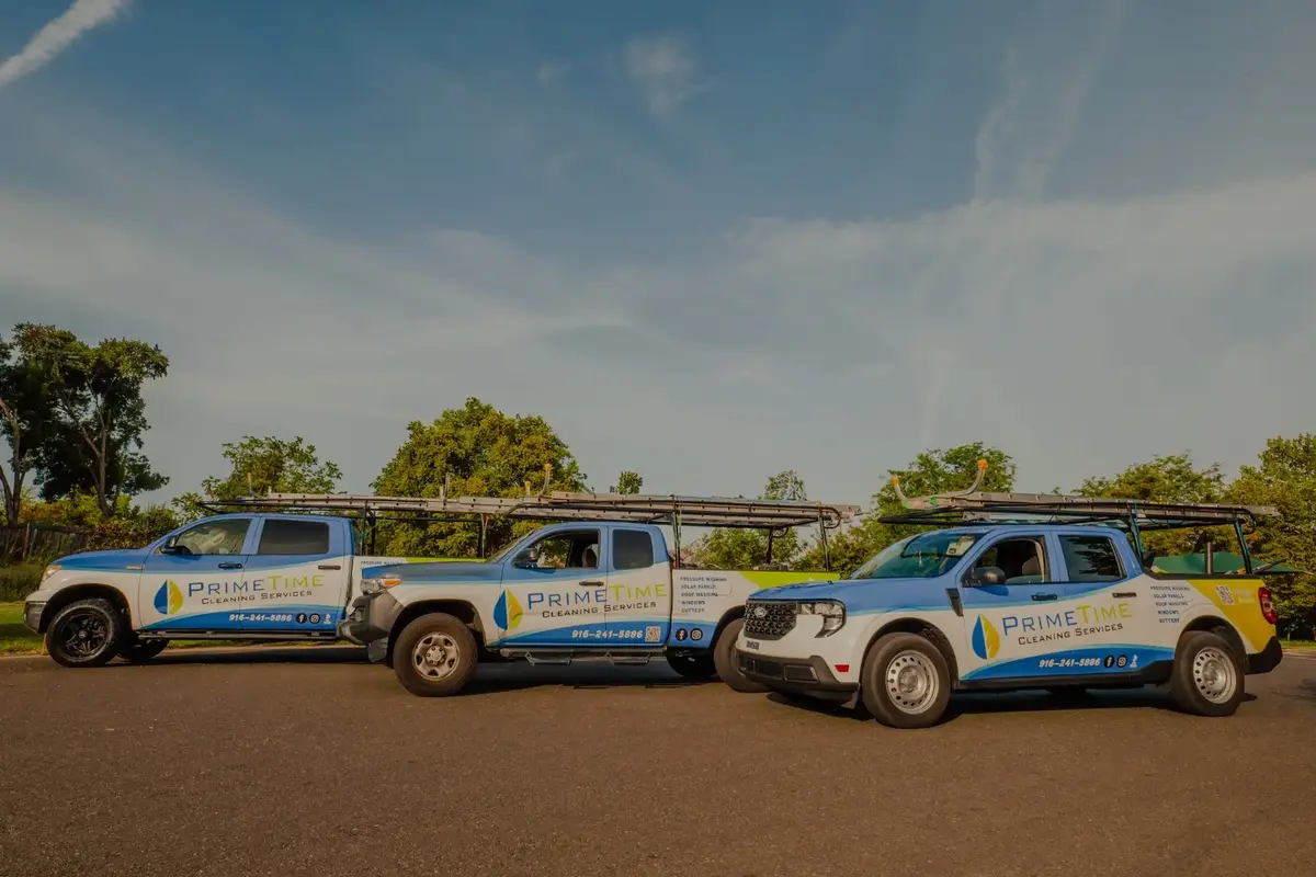 Primetime Cleaning Services branded service trucks parked together